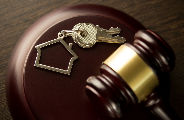 Gavel with house keys