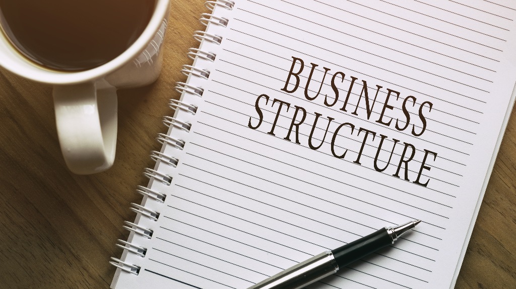 Business Structure, pen and cup of coffee