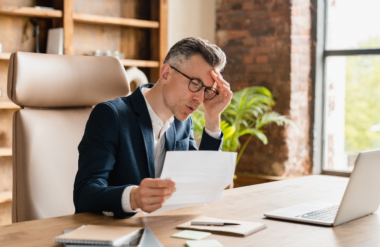Businessman is overload in office