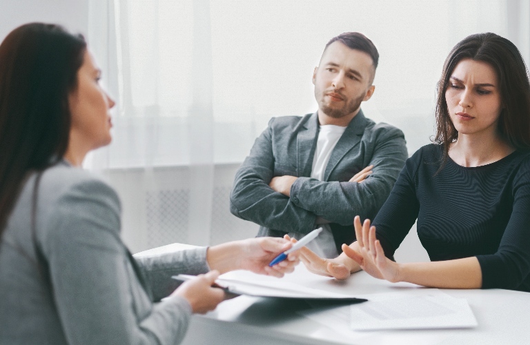 couple is consulting with lawyer