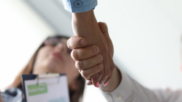 People Shaking hands up close